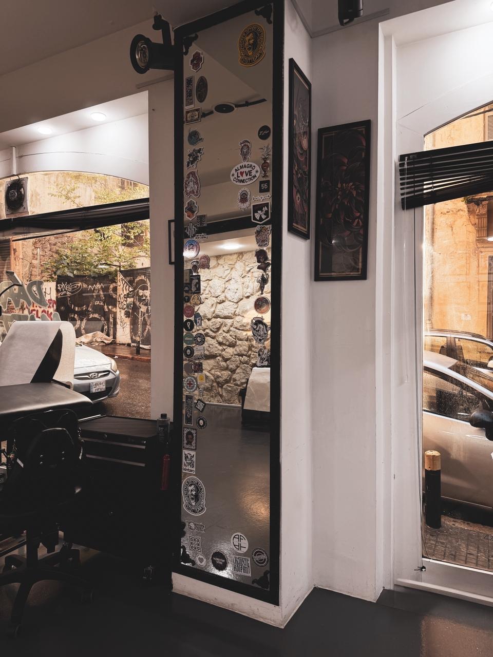 Sticker-covered standing mirror with street view